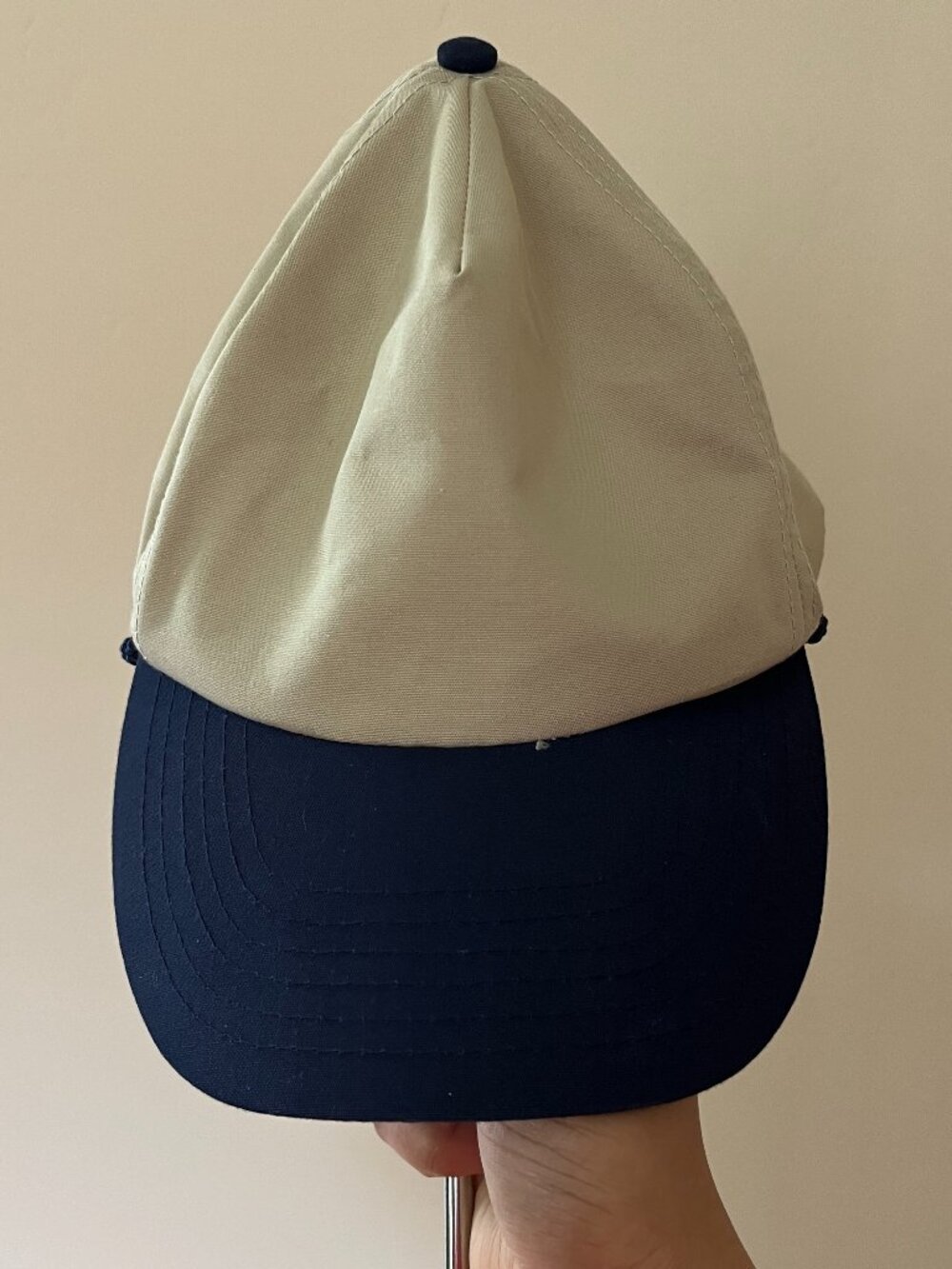 Tan and navy blue baseball cap gorpcore outdoor granola sporty golf hiking bloke